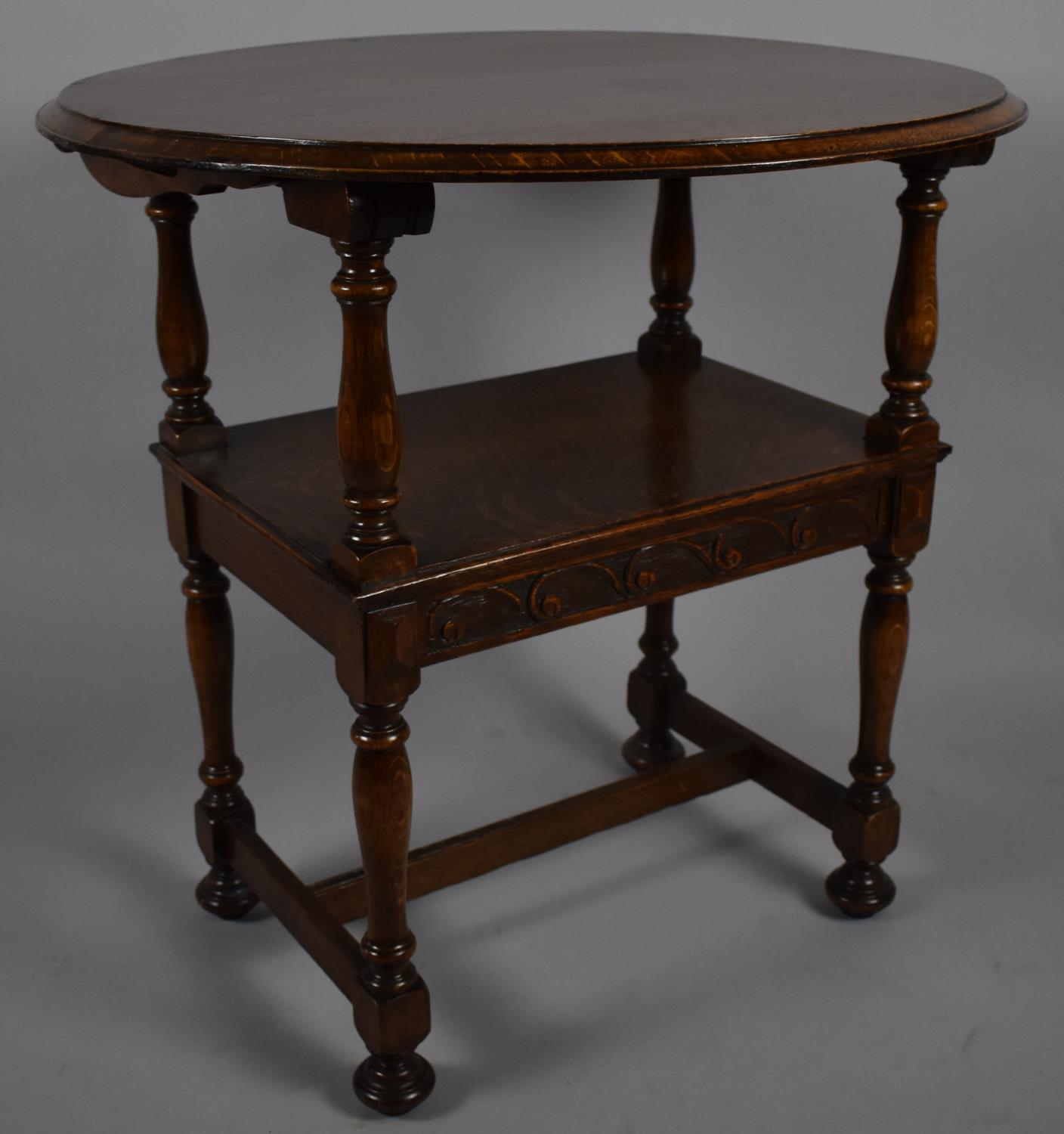 A Mid 20th Century Oak Circular Topped Monks Style Seat with Carved Decoration, 73cm Diameter - Image 2 of 2