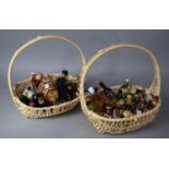 Two Wicker Baskets Containing Miniature Whiskies and Liqueurs