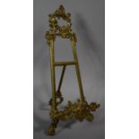 A Modern Brass Easel Picture Stand with Rococo Style Decoration, 40cm high