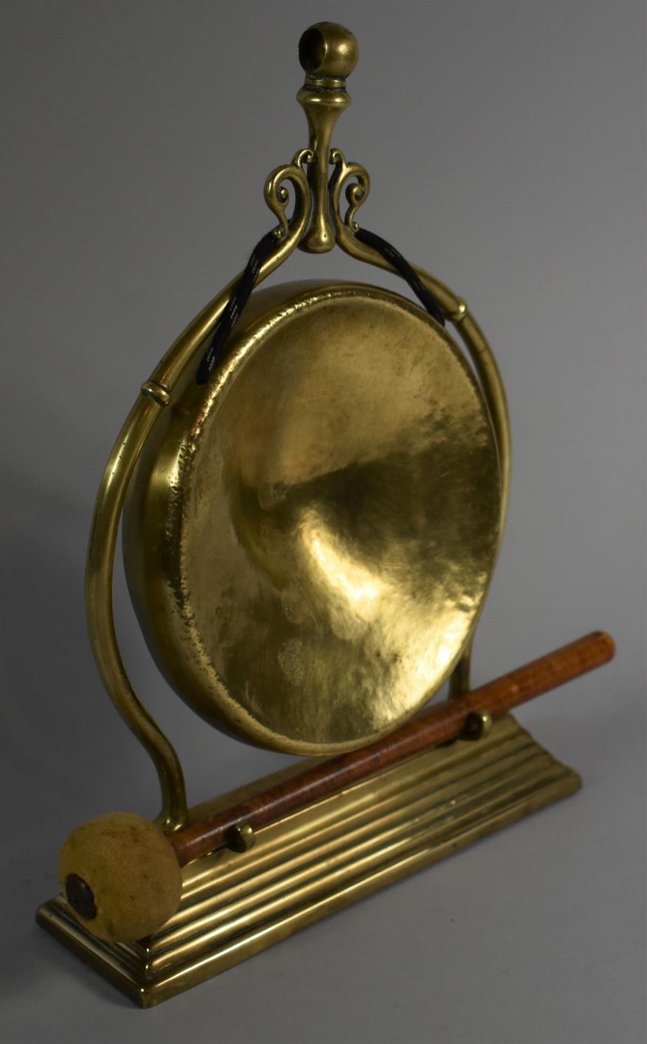 A Late 19th/Early 20th Century Brass Table Top Dinner Gong with Clapper, 29cm High