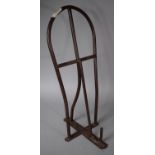 A Metal Wall Fixing Saddle Stand by Stubbs