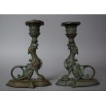 A Pair of Green Patinated Bronze Candlesticks in the French Second Empire Style, The Supports in the
