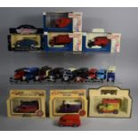 A Collection of Boxed and Playworn Diecast Vintage Vans