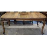 An Edwardian Mahogany Windout Dining Table on Cabriole Supports, Size When Fully Extended 179x105cm