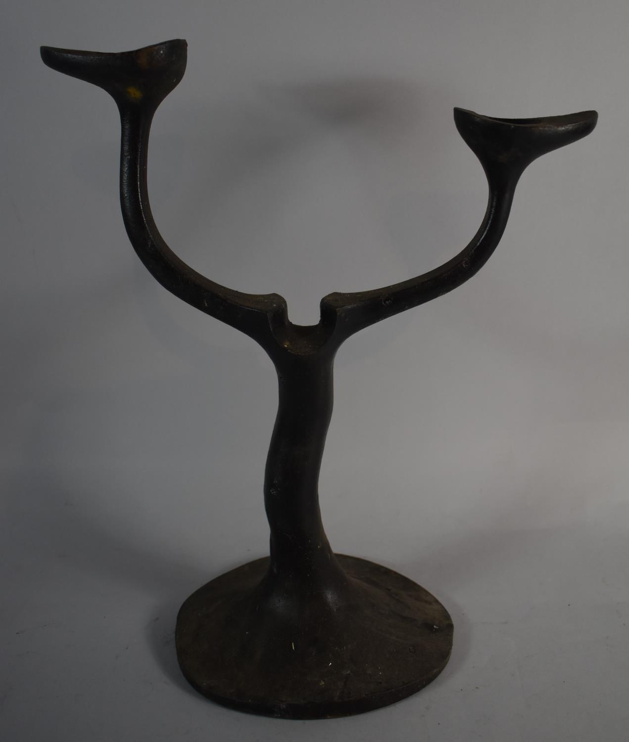 An Unusual Cast Iron Two Branch Candelabra, 39.5cm High