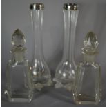 A Pair of Silver Topped Glass Bud Vases Together with a Pair of Glass Scent Bottles