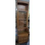 A 1970's Glazed Narrow Bookcase with Cupboard Base, 51.5cm wide