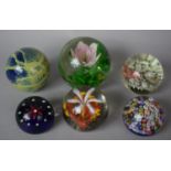 A Collection of Six Glass Paperweights to Include Millefiori and Selkirk Examples