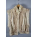 A Vintage Ladies Sleeveless Fur Jacket