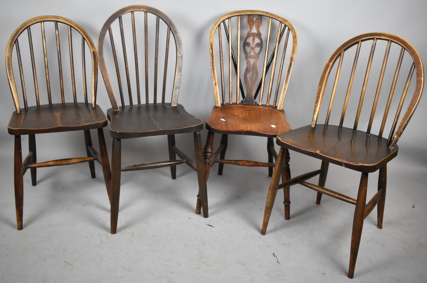 Three Hooped Spindle Back Kitchen Chairs to Include Ercol and One Fleur De Lys Spindle Back with Elm