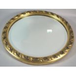 An Oval Bevel Edge Gilt Frame Wall Mirror