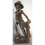 A Carved Indonesian Hardwood Figure of Fisherman with Net, 30cm High