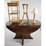 A Wicker Three Tier Stand, Jardiner Stand, Pine Table Lamp and Drop Leaf Table