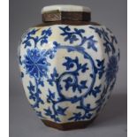 A Chinese Blue and White Nanking Octagonal Ginger Jar with Cover, Having Scrolling Foliate