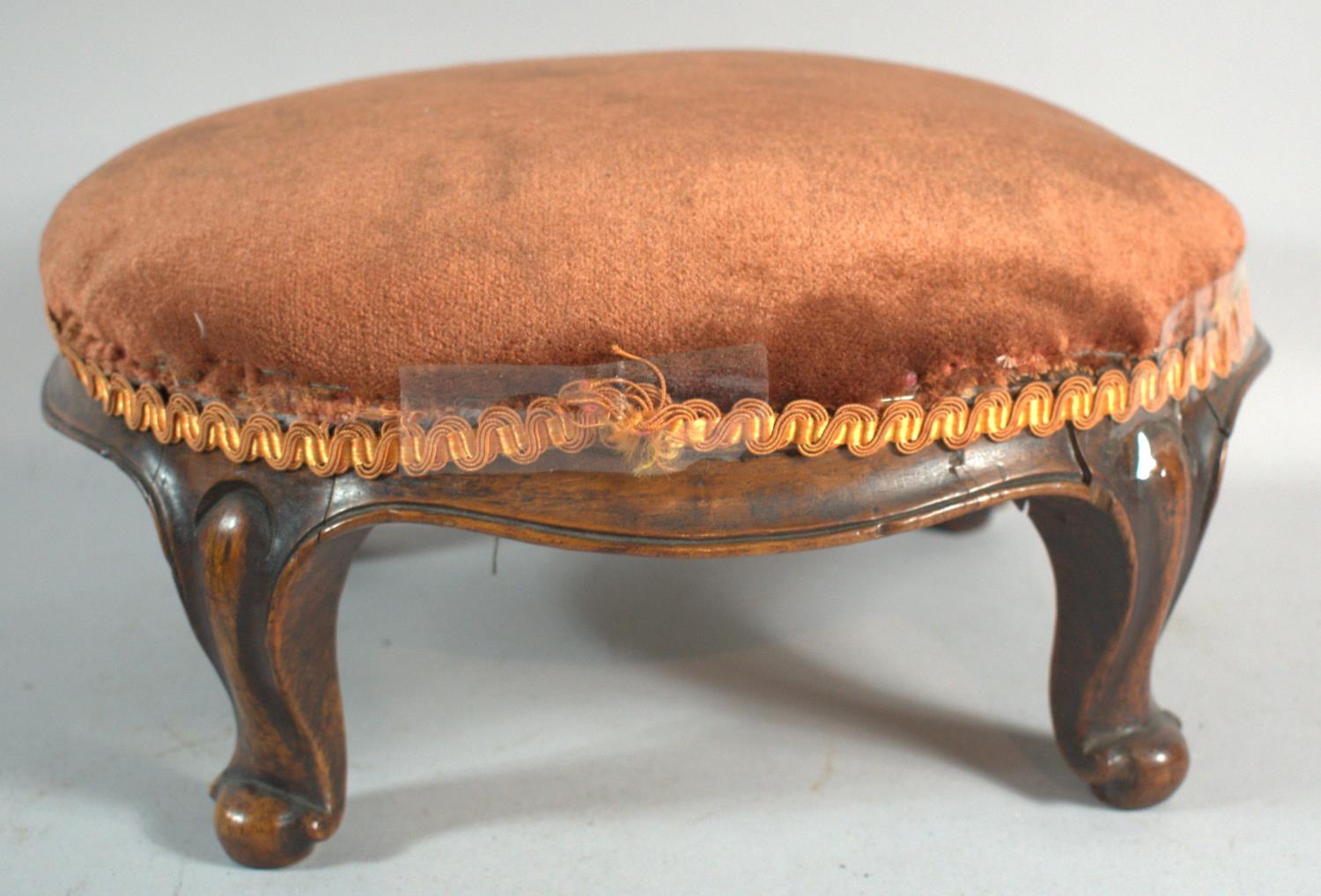 A Late 19th Century Mahogany Framed Oval Foot Stool on Scrolled Supports, 34cm Long