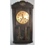 An Edwardian Wall Clock with Eight Day Movement