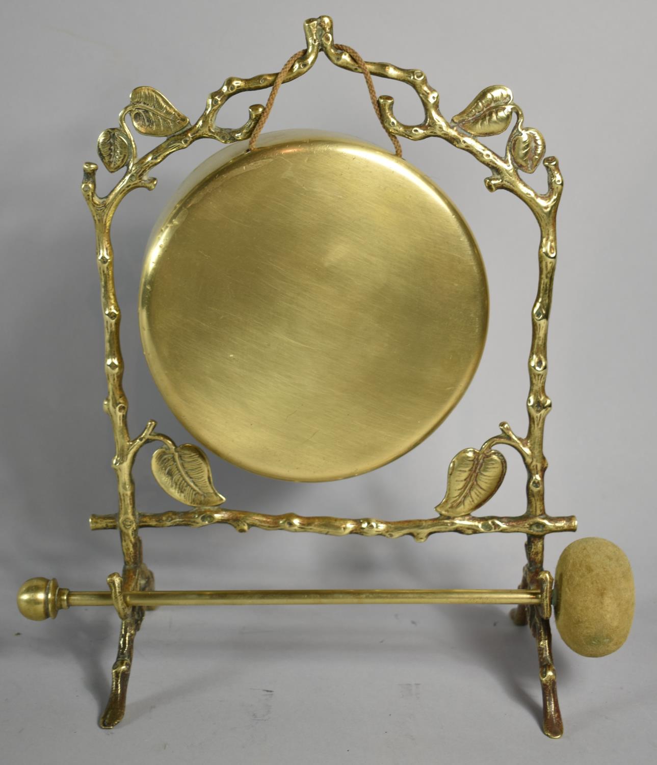 A Late 19th /Early 20th Century Brass Table Gong with Hammer, Set on Naturalistic Branch Style