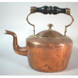 A Vintage Copper Kettle with Turned Wooden Handle, 21cm High