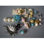 A Collection of Costume Jewellery to Include Corocraft Brooches and Earrings etc