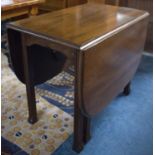 An Edwardian Mahogany Drop Leaf Table, 90cm wide