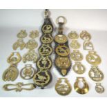 A Collection of Victorian and Later Horse Brasses, Leather Straps etc