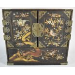 A Chinese Inlaid Collectors Cabinet with Pierced Strapwork Hinges to Panelled Doors which open to