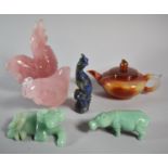 A Collection of Five Oriental Carved Pink Stone, Jadeite and Iridescent Stone Animals and Birds