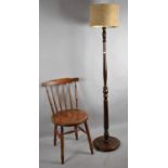 A Circular Seated Spindle Back Chair and an Edwardian Standard Lamp