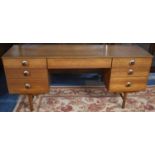 A 1970's Kneehole Dressing Table with Centre Long Drawer and Three Drawers Either Side, 147cm Wide