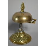 A late 19th Century Brass Reception Desk Bell on Circular Plinth Base (13cms High) Support has