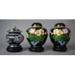 A Pair of Cloisonne Ginger Jars on Black Ground decorated with Insect and Flowers on Pierced