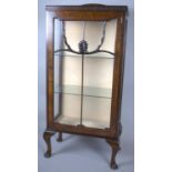 An Edwardian Walnut Glazed Display Cabinet with Two Inner Shelves, Greek Key Blind Carving to Top