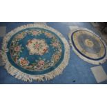 Two Circular Chinese Woollen Rugs