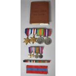 A Set of Four WWII Medals to Include France and Germany Star with Miniatures and Soldier's Service