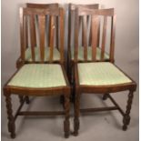 A Set of Four Edwardian Oak Dining Chairs