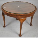 A Circular Walnut Coffee Table, 60cm Diameter