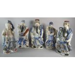 A Collection of Five Oriental Blue and White Figures of Immortals, 34cm high