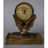 A Small French Bronze Second Empire Mantel Clock in the Form of a Pair of Wings Supporting