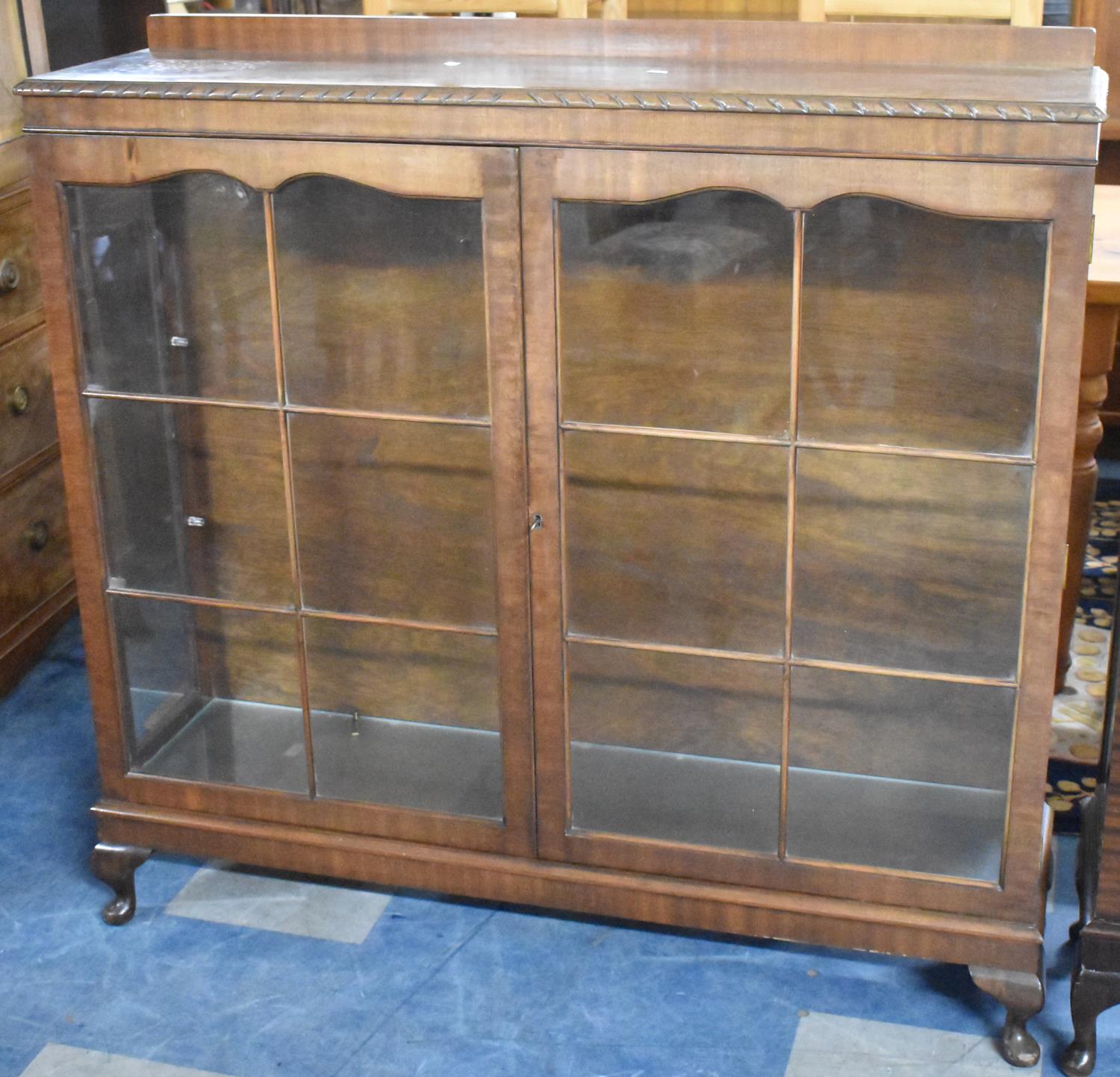 An Edwardian Galleried Mahogany Glazed Bookcase with Two Inner Glass Shelves