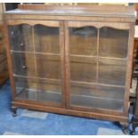 An Edwardian Galleried Mahogany Glazed Bookcase with Two Inner Glass Shelves