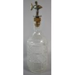 A Farrow and Jackson Winesaver Tap Together with Moulded Glass Bottle Inscribed "Federal Law Forbids