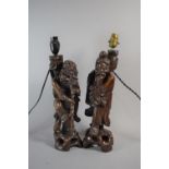 A Pair of Chinese Carved Wooden Table Lamps in the Form of Immortals, 37cm high