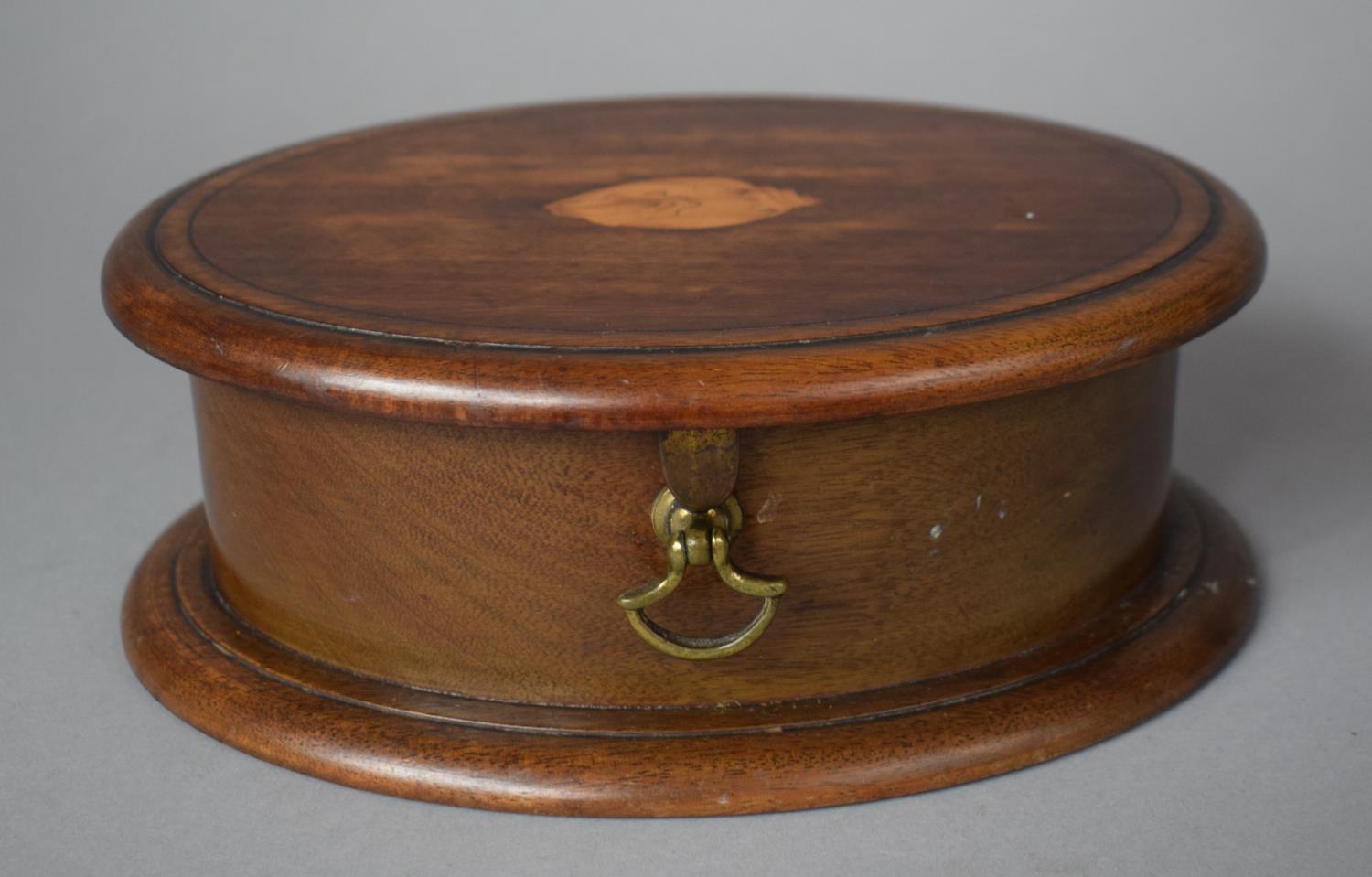 An Inlaid Oval Walnut Jewellery Box, 21.56cms Wide