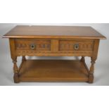 A Mid 20th Century Oak Two Drawer Coffee Table with Stretcher Shelf, 91.5cm Wide