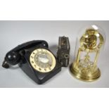 A Vintage Telephone, Pillar Clock and a Clockwork Cine Camera