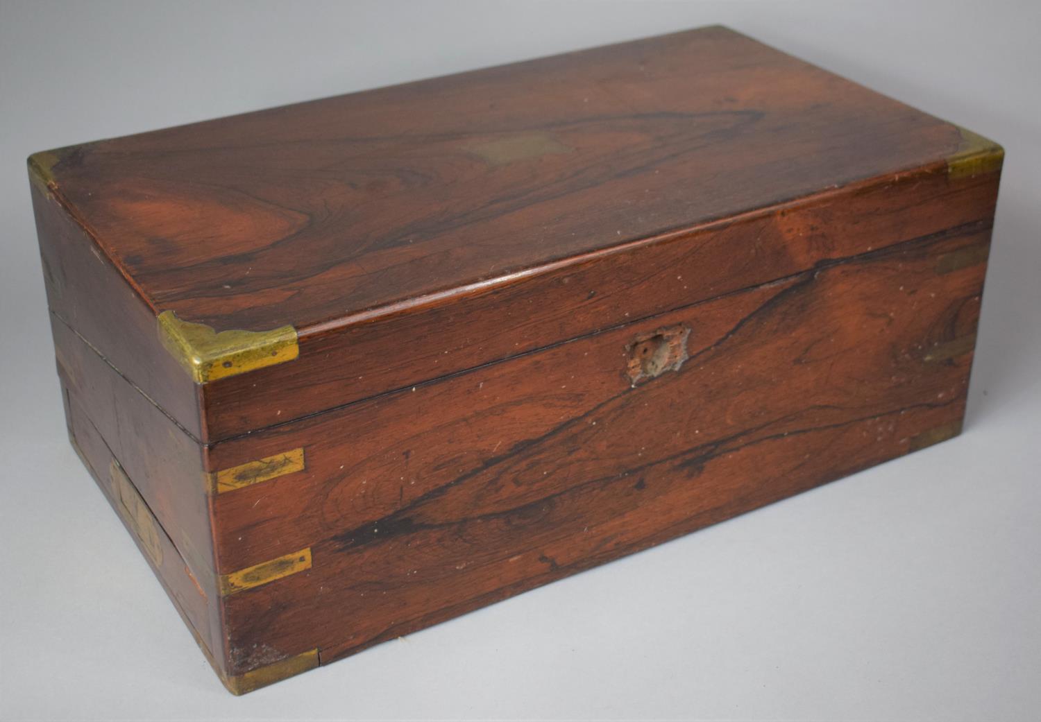 A Late 19th Century Rosewood Campaign Style Writing Slope with Brass Inset Handles and Mounts,