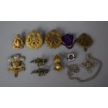 A Collection of Various Military Badges and St. John's Ambulance Pendant