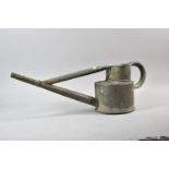 A Galvanised Iron Watering Can, 62cm wide
