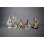 A Collection of Five Continental and Other Figural Ornaments
