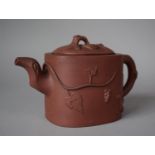A Yixing Teapot Decorated with Leaf and Vine, Impressed Seal Mark to Base, 11cm High